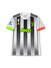 Juventus 2019-20 Palace special edition jersey featuring Cristiano Ronaldo #7, adidas x Palace fourth soccer kit with black and white vertical stripes fading into a dotted gradient, neon green Jeep sponsor and Juventus crest, orange Palace branding, contrasting green and orange sleeve cuffs, and RONALDO name with fluorescent green number 7 on the back.