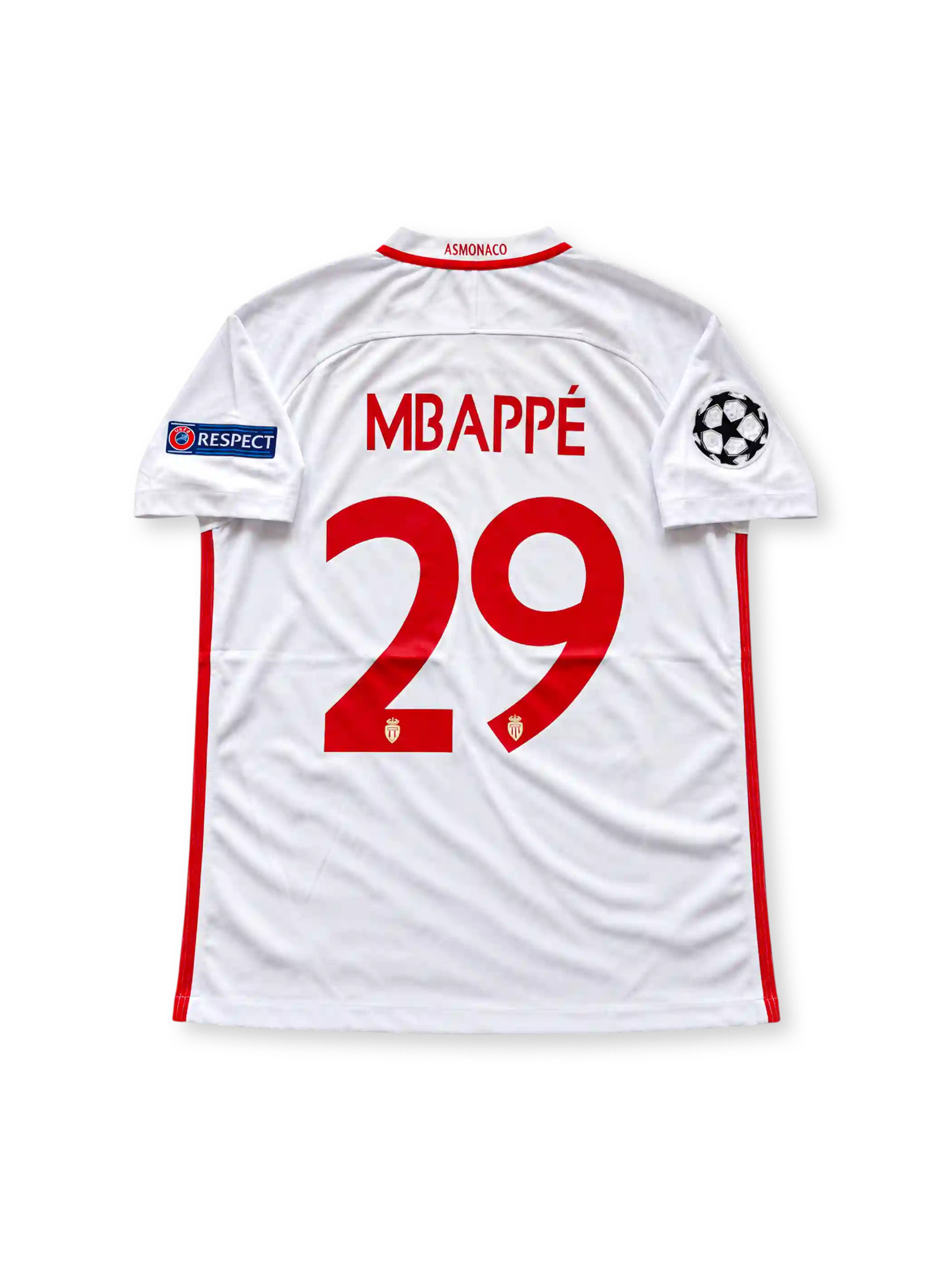 AS Monaco 2016-17 home jersey featuring Kylian Mbappe #29, Nike red and white diagonal split soccer shirt with subtle tonal horizontal graphics, white sleeves, red-trimmed V-neck collar, FEDCOM sponsor logo, AS Monaco club crest, UEFA Champions League and Respect sleeve patches, and MBAPPÉ name with number 29 on the back.