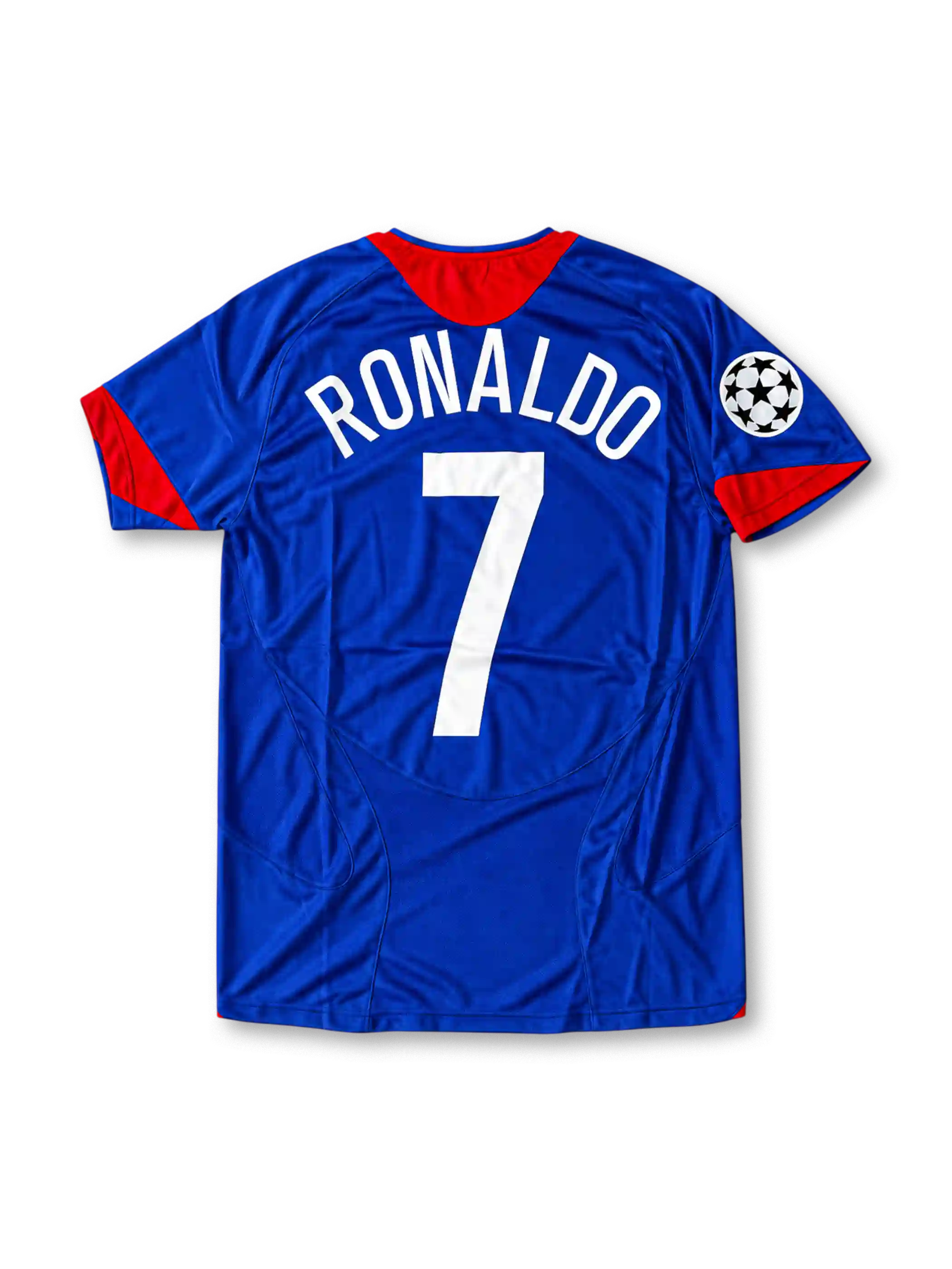 Front view of the 2005/06 Manchester United blue away soccer jersey by Nike, featuring red shoulder accents, a central club crest, white Vodafone sponsor, and UEFA Champions League sleeve patch.
