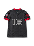 Front view of the black Iron Maiden The Book of Souls 2016 football jersey featuring a red V-neck collar, red sleeve trim, tonal all-over graphics, Eddie shield artwork, white band logo, and decorative sleeve patches.