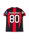 Front view of the 2010/11 AC Milan home soccer jersey featuring red and black vertical stripes, white adidas logo, Fly Emirates sponsor, club crest with gold star, UEFA Champions League starball patch, seven-time winners badge, and UEFA Respect patch.