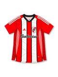 Front view of the River Plate 2002/03 red and white striped away soccer jersey featuring a black V-neck collar, red adidas shoulder stripes, club crest, Budweiser sponsor, and textured mesh side panels.