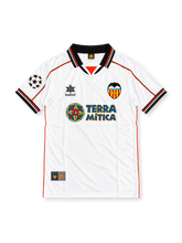 Valencia CF 1999-00 home jersey by Luanvi, featuring a white body, black and orange trim, Terra Mítica sponsor, club crest and UEFA Champions League sleeve patch.