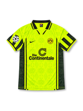 Borussia Dortmund 1996-97 Nike home jersey featuring a fluorescent yellow BVB monogram pattern, black geometric sleeve panels, Die Continentale sponsor and Andreas Möller number 10.