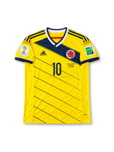 Front view of Colombia's 2014 World Cup yellow adidas home jersey featuring navy diagonal stripes, number 10, national team crest, Colombia vs Uruguay June 28 match lettering, and FIFA World Cup sleeve patches.