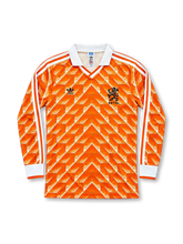 Front view of the Netherlands 1988 orange long-sleeve home football jersey featuring Adidas geometric chevron graphics, a white fold-over collar, three white sleeve stripes and the KNVB national team crest.