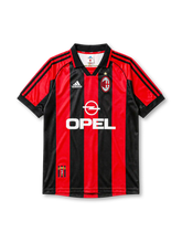 AC Milan 1998/99 home jersey with red and black stripes, adidas logo, and Opel sponsor branding