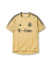 Bayern Munich 2004/05 away jersey in gold with black adidas stripes and T-Com sponsor branding