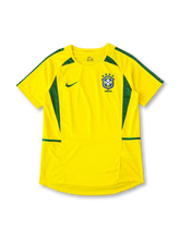 Brazil 2002 training jersey in yellow with diagonal green panel detailing and CBF crest