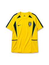Brazil 2002 training jersey in yellow with diagonal green panel detailing and CBF crest