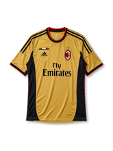 AC Milan 2013/14 third jersey in gold and black with chest pocket and Fly Emirates sponsor branding