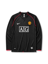 Manchester United 2007/08 away long sleeve jersey in black with red piping and AIG sponsor branding