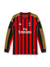 AC Milan 2013/14 home long sleeve jersey in red and black stripes with gold adidas sleeve detailing and Fly Emirates branding
