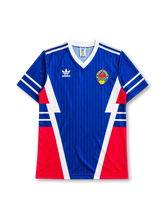 Yugoslavia 1990 World Cup home jersey in blue with red and white angular panel design