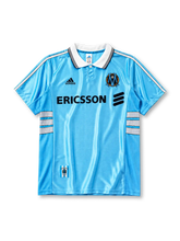 Olympique Marseille 1998/99 away jersey in sky blue with white stripe detailing and Ericsson branding