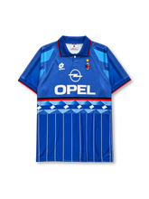 AC Milan 1995/96 third jersey in blue with geometric diamond pattern and Opel sponsor branding