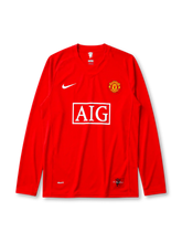 Manchester United 2007/08 home long sleeve league version jersey in red with rounded crest and AIG sponsor branding