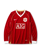 Manchester United 2006/07 home long sleeve jersey in red with gold piping and AIG sponsor branding