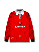 Manchester United 1996/97 home long sleeve jersey in red with diamond sleeve pattern and Sharp branding
