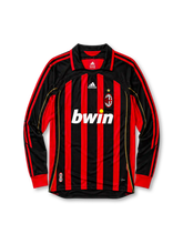 AC Milan 2006/07 home long sleeve jersey in red and black stripes with gold piping and bwin branding