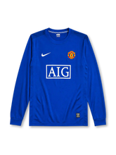 Manchester United 2008/09 third long sleeve jersey in royal blue with rounded crest and AIG sponsor branding