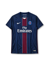 Paris Saint-Germain 2016/17 navy Nike home jersey with red pinstripe center band and Fly Emirates sponsor