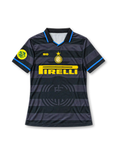 Inter Milan 1997/98 third jersey in black and charcoal-gray horizontal stripes with blue trim, yellow Pirelli sponsor, and club crest, front view.
