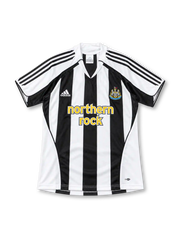 Newcastle United 2005/06 black-and-white striped home jersey featuring adidas shoulder stripes, Northern Rock sponsor, and club crest, front view.