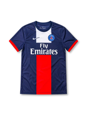 Paris Saint-Germain 2013/14 navy home jersey featuring red-and-white central panels, Nike Swoosh, PSG crest, and Fly Emirates sponsor, front view.