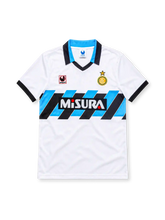 Inter Milan 1990/91 white away jersey featuring blue-and-black diagonal chest graphics, Uhlsport branding, Misura sponsor, and club crest, front view.