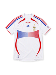 France 2006 white away jersey featuring blue-and-red chest graphics, adidas shoulder stripes, gold FFF crest, and red side panels, front view.