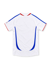 France 2006 white away jersey featuring blue-and-red chest graphics, adidas shoulder stripes, gold FFF crest, and red side panels, front view.