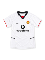 Manchester United 2002/03 white away jersey with black V-neck collar, red sleeve trim, Nike Swoosh, club crest and Vodafone sponsor.