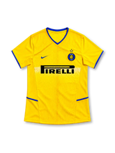Inter Milan 2002/03 yellow third jersey with blue V-neck trim, Nike Swoosh, Inter crest, curved front pattern and black Pirelli sponsor.
