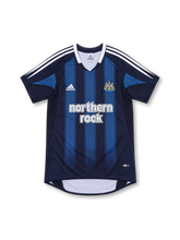 Newcastle United 2004/05 navy away jersey with blue vertical stripes, white adidas shoulder stripes, club crest and Northern Rock sponsor.