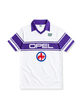 Fiorentina 1983–85 white away jersey with purple polo collar, striped sleeves, Opel chest sponsor, Ennerre logo and red fleur-de-lis emblem.