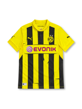 Borussia Dortmund 2012/13 Champions League home jersey with yellow and black vertical stripes, Puma logo, two-star BVB crest and magenta EVONIK sponsor.