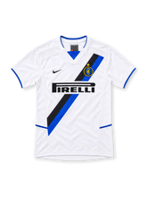 Inter Milan 2002/03 white away jersey with black-and-blue diagonal sash, Nike Swoosh, gold-star Inter crest, black Pirelli sponsor and blue-trimmed V-neck.