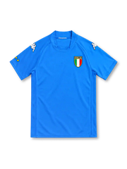 Italy 2002 azure-blue home jersey by Kappa with a matching rounded collar, white Omini shoulder logos, Italian tricolor shield crest and yellow sleeve star detailing.