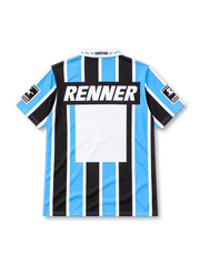 Grêmio 1995/96 home jersey featuring sky-blue, black and white vertical stripes, a white polo collar with blue zigzag stitching, Penalty branding, three-star club crest, Renner chest sponsor and sleeve patches.