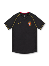 Portugal 2006 black away jersey by Nike featuring gold shoulder seam stitching, gold Swoosh, red inner collar trim, Portuguese federation crest and sponsor-free front.