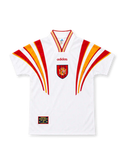 Spain 1996 white third jersey by adidas with sweeping red-and-yellow shoulder stripes, matching striped V-neck collar, red adidas wordmark, central Spanish federation crest and decorative hem patch.