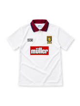Aston Villa 1994/95 white third jersey featuring a claret polo collar with blue edging, single-button placket, black ASICS logo, Aston Villa crest and red Müller sponsor panel.
