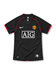 Manchester United 2007/08 black Nike away jersey with red curved shoulder piping, black V-neck collar, white Nike Swoosh, Manchester United crest, rectangular white AIG sponsor and NikeFIT branding.