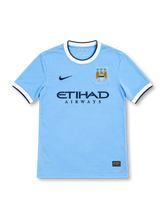 Manchester City 2013/14 sky-blue Nike home jersey featuring a white crew-neck collar with navy trim, white sleeve cuffs, navy Nike Swoosh, three-star club crest, Etihad Airways sponsor and Authentic hem label.