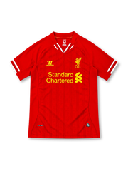 Liverpool 2013/14 red Warrior home jersey featuring subtle tonal pinstripes, white-trimmed V-shaped collar and sleeve cuffs, yellow Warrior logo, yellow Liver Bird crest and Standard Chartered sponsor.