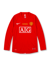 Manchester United 2007/08 Champions League Final red Nike home long sleeve jersey with white Swoosh, club crest, AIG sponsor, gold Final Moscow 2008 chest lettering, and Red Devils hem patch.