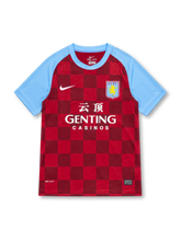 Aston Villa 2011/12 Nike home jersey with claret checkerboard pattern, sky-blue sleeves and collar, white Nike Swoosh, AVFC crest, Genting Casinos sponsor with Chinese characters, and Dri-FIT hem detailing.