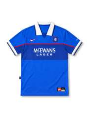 Rangers FC 1997–99 Nike home jersey in royal blue with a white fold-down collar, darker-blue chest band, thin red piping, white McEwan's Lager sponsor, red-outlined Nike Swoosh, Rangers shield crest, and white-trimmed sleeves.