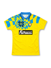 Inter Milan 1992/94 yellow third jersey with blue checkerboard pattern, Umbro logo and Fiorucci sponsor